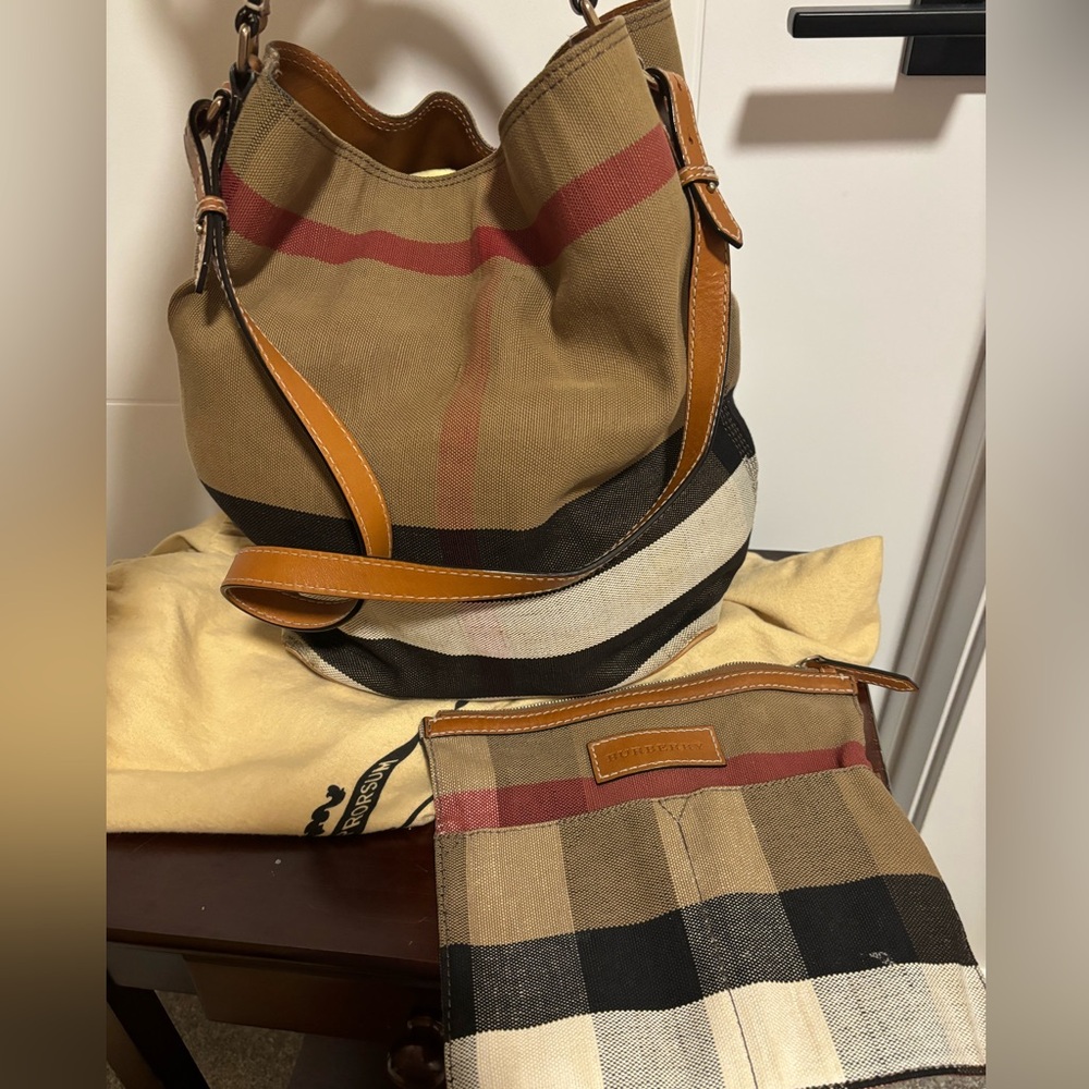 Used Burberry fabric bag with pouch. Bought in New York 6 years ago.